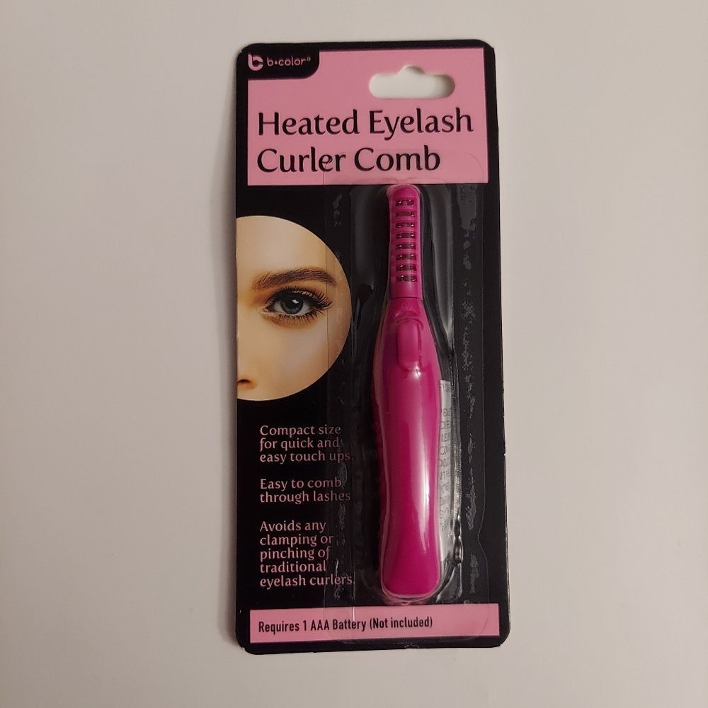 Heated
Eyelash Curler Comb NWT